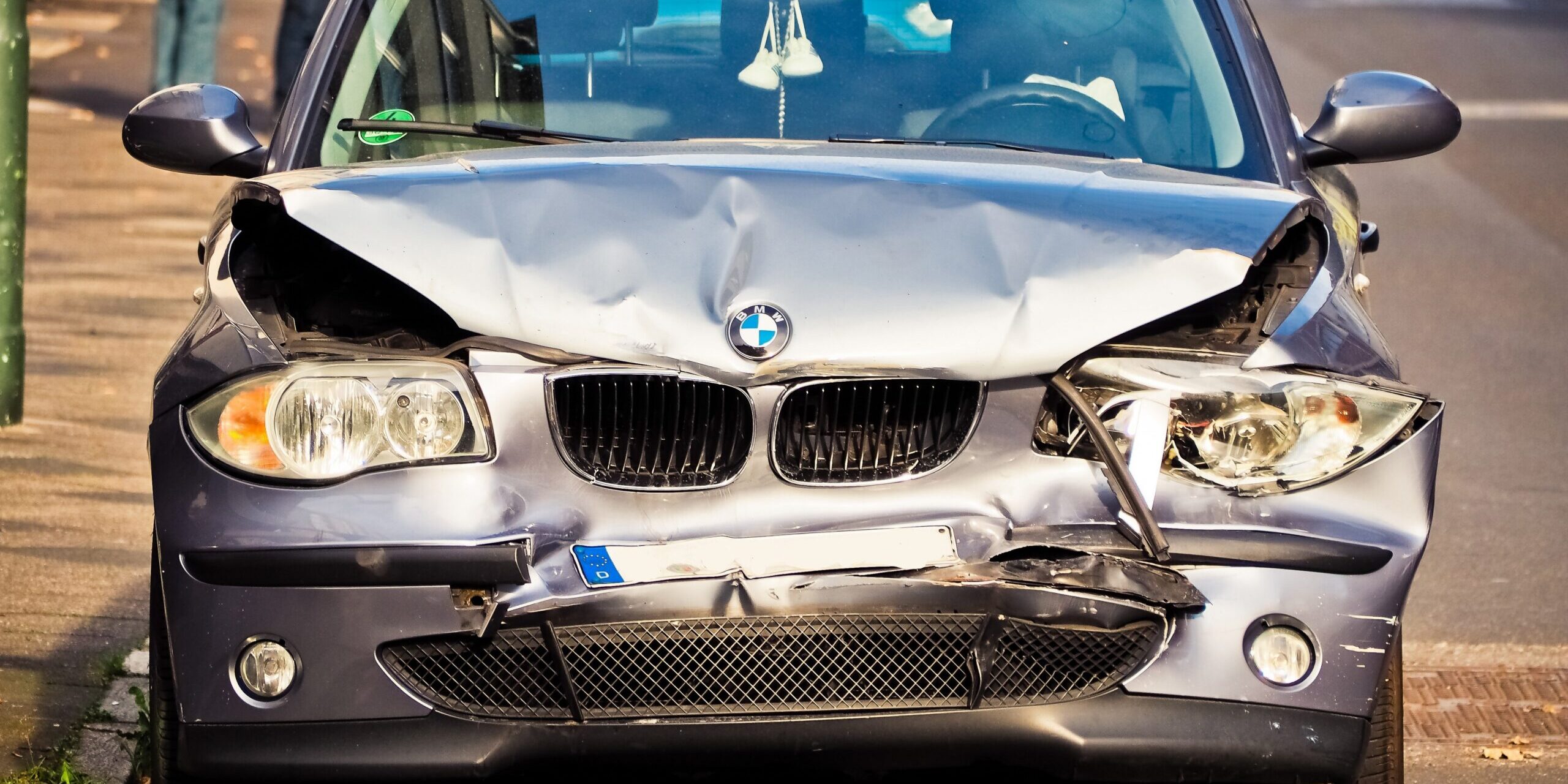 car with smashed front end