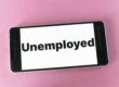 unemployed on a phone