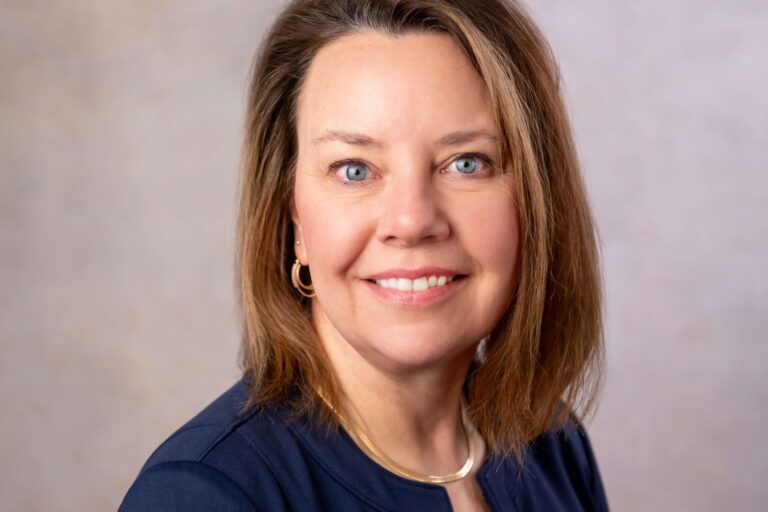 woman with gold earrings