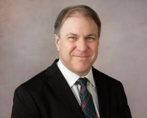 Long Tern Disability attorney in plaid tie