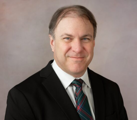 Man in plaid tie