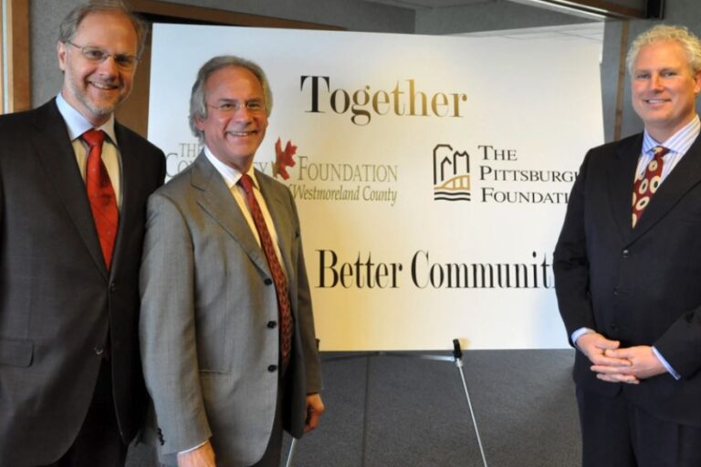 Grant Oliphant, former CEO of The Pittsburgh Foundation, Vince Quatrini Jr. and Kirk Utzinger, former executive director of the CFWC pose for a photo in 2015, the year The Pittsburgh Foundation and CFWC merged.