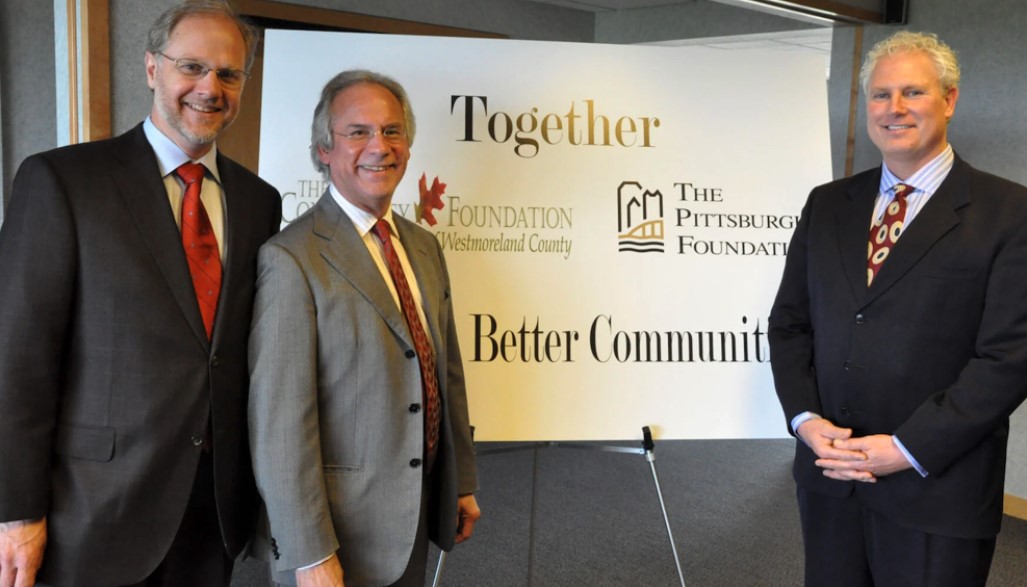 Grant Oliphant, former CEO of The Pittsburgh Foundation, Vince Quatrini Jr. and Kirk Utzinger, former executive director of the CFWC pose for a photo in 2015, the year The Pittsburgh Foundation and CFWC merged.